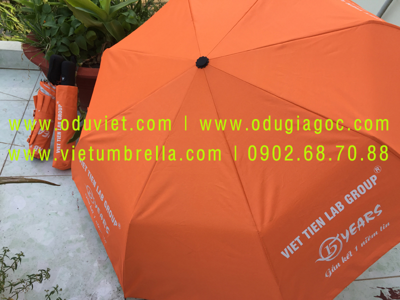 xưởng sản xuất ô dù cầm tay in logo quảng cáo